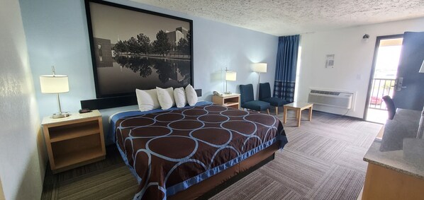 Premium bedding, desk, laptop workspace, blackout curtains