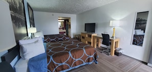 Premium bedding, desk, laptop workspace, blackout curtains