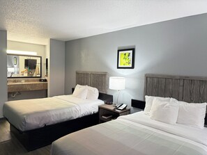 Desk, blackout curtains, free WiFi, bed sheets