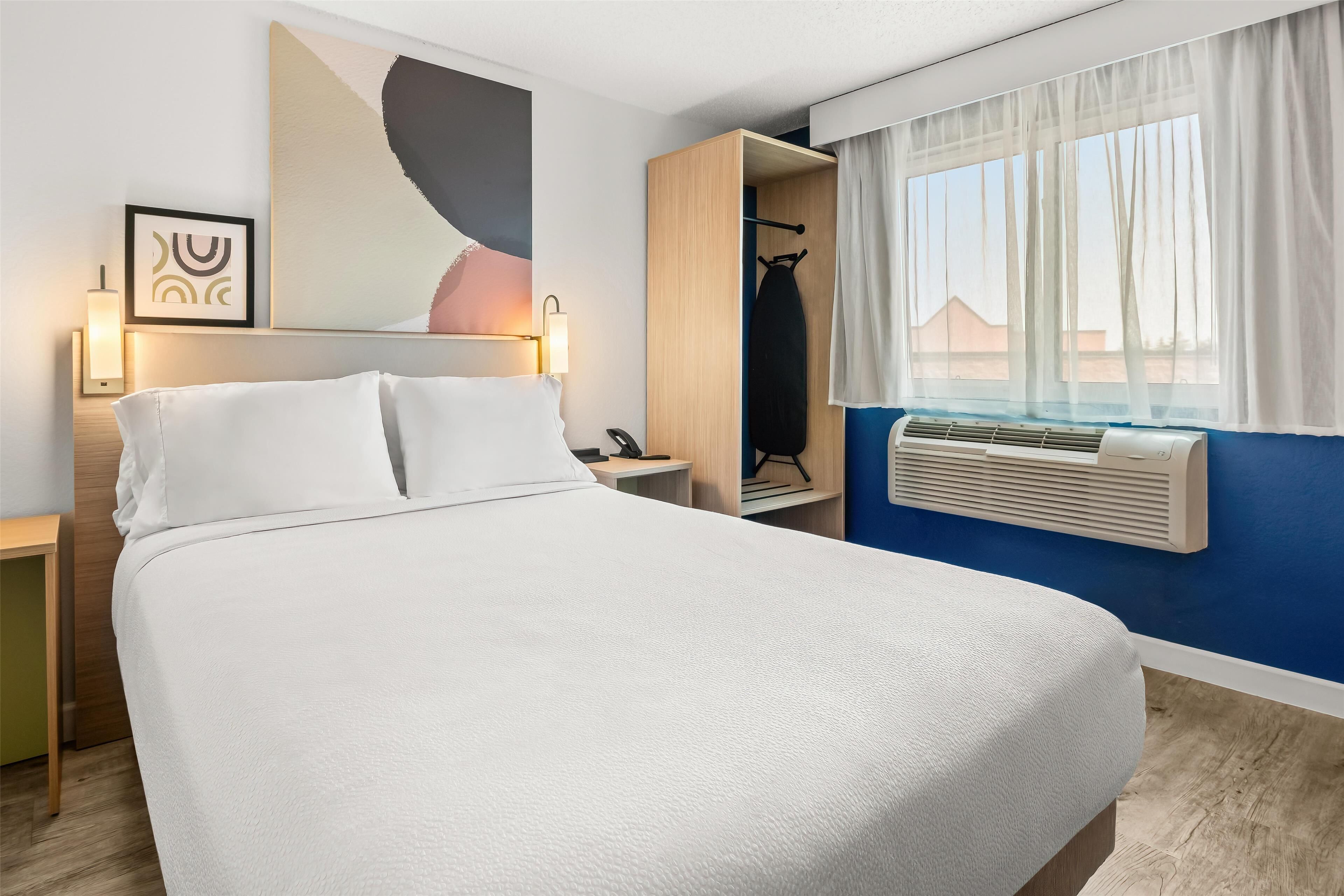 room, 1 queen bed | 1 bedroom, laptop workspace, blackout curtains, iron/ironing board