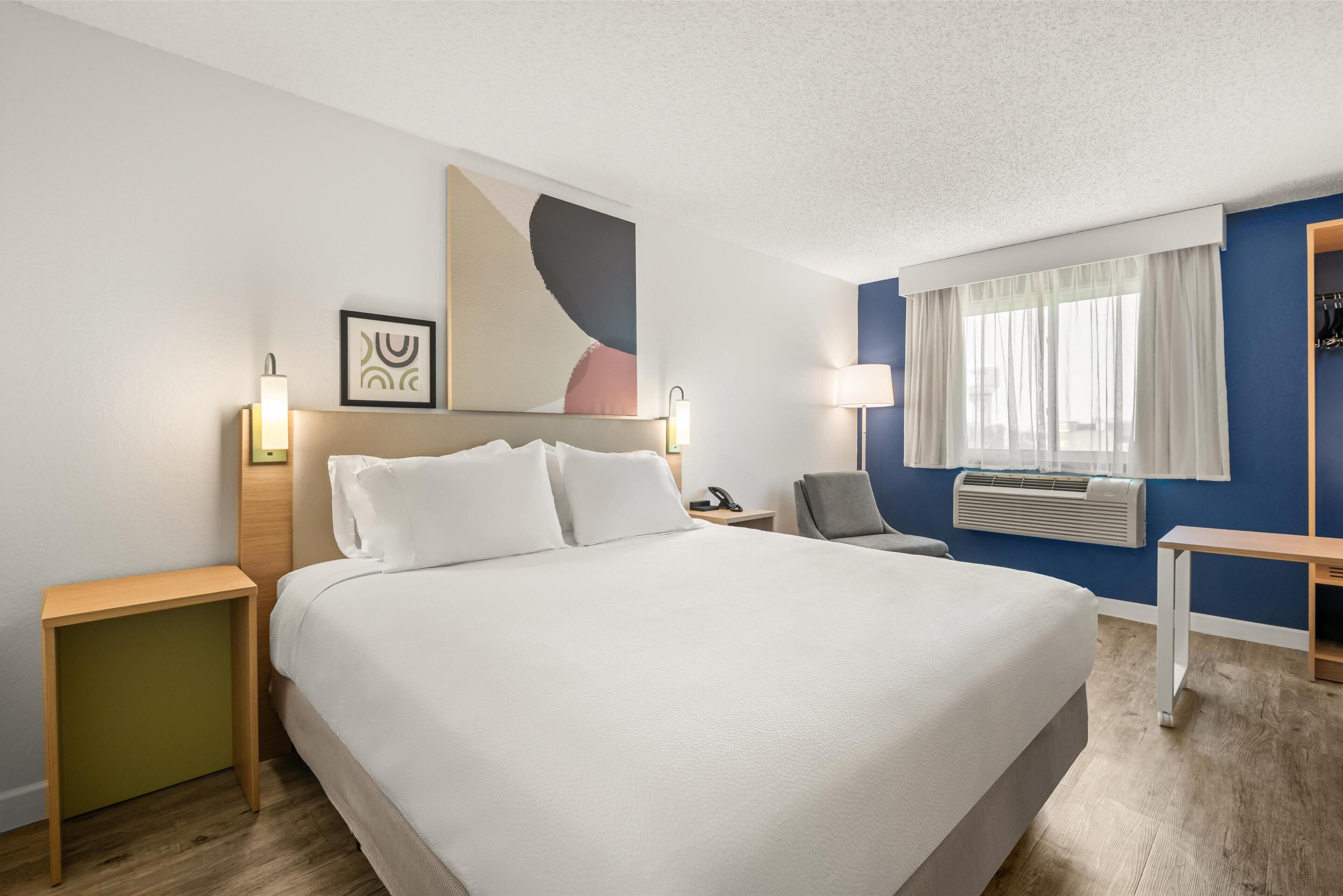 room, 1 king bed | 1 bedroom, laptop workspace, blackout curtains, iron/ironing board