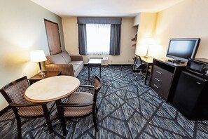 Suite, 1 King Bed with Sofa bed, Non Smoking (Parking View) | Living area | 32-inch LCD TV with cable channels, TV - Quality Inn & Suites Marinette (Marinette)