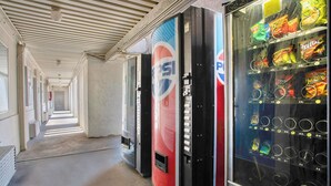 A hallway with vending machines and a Pepsi refrigerator. - Motel 6 Tucson, AZ - East Williams Center (Tucson)