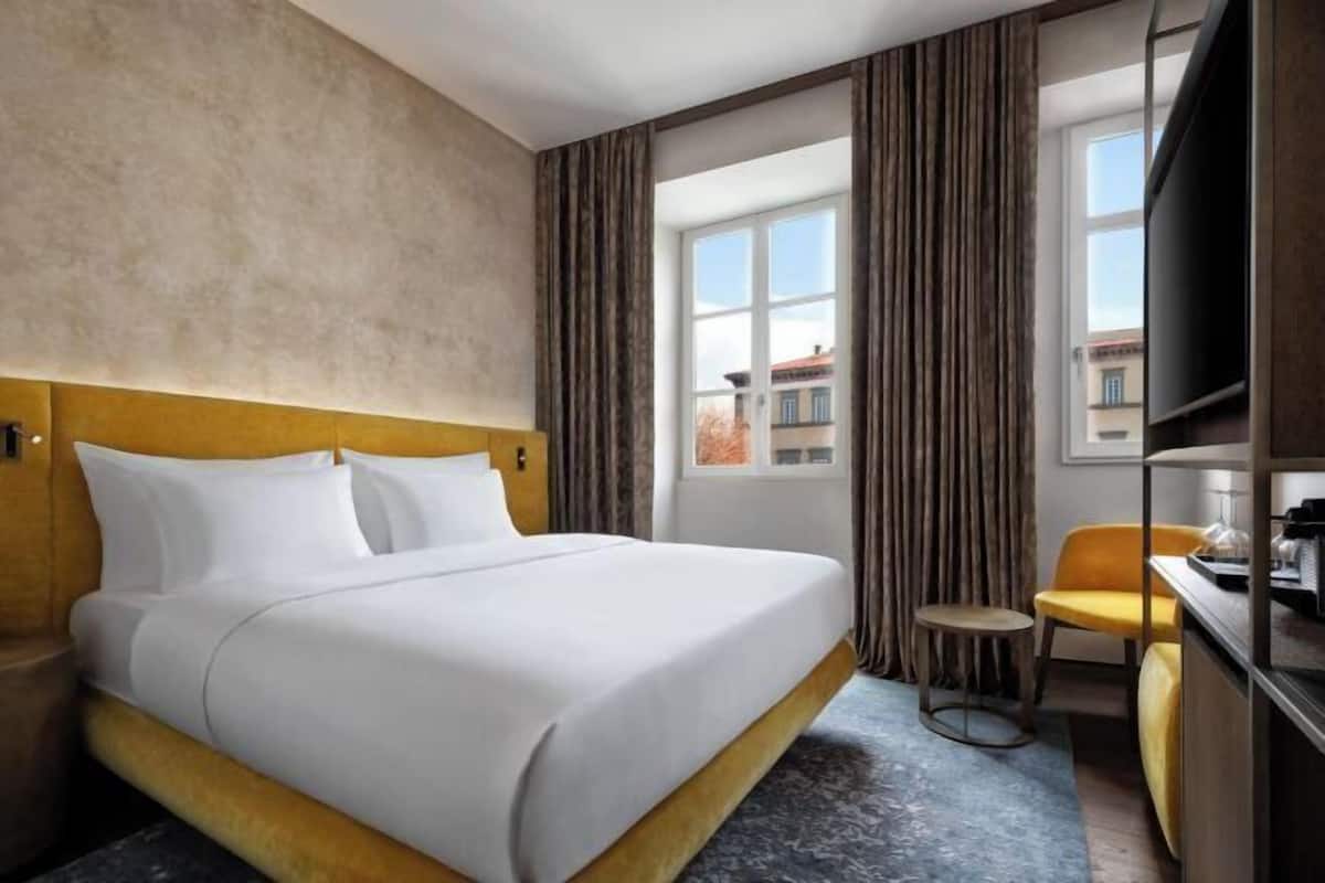 Ropa de cama de alta calidad, minibar, caja fuerte y wifi gratis