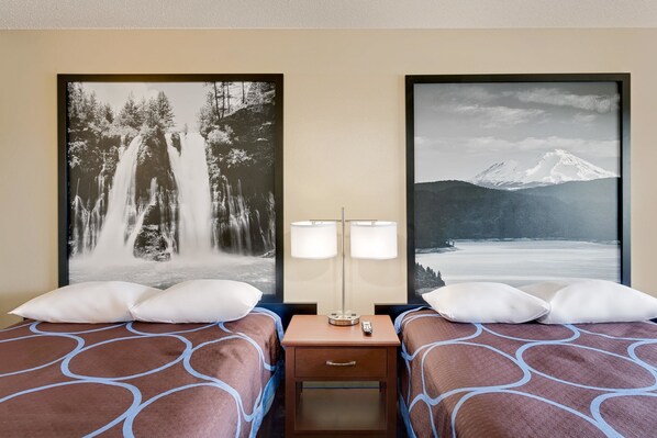 Hypo-allergenic bedding, desk, iron/ironing board, free cots/infant beds