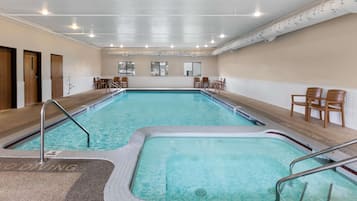 Indoor pool, open 8:00 AM to 11:00 PM, pool umbrellas, pool loungers