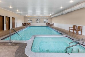 Indoor pool, open 8:00 AM to 11:00 PM, pool umbrellas, sun loungers