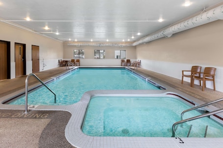 Indoor pool, open 8:00 AM to 11:00 PM, pool umbrellas, sun loungers. Super 8 by Wyndham St. Ignace