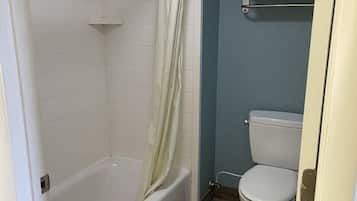 Room, 2 Double Beds, Non Smoking | Bathroom | Combined shower/tub, hair dryer, towels
