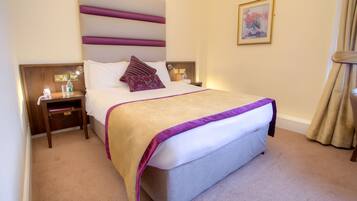 Desk, laptop workspace, blackout drapes, iron/ironing board