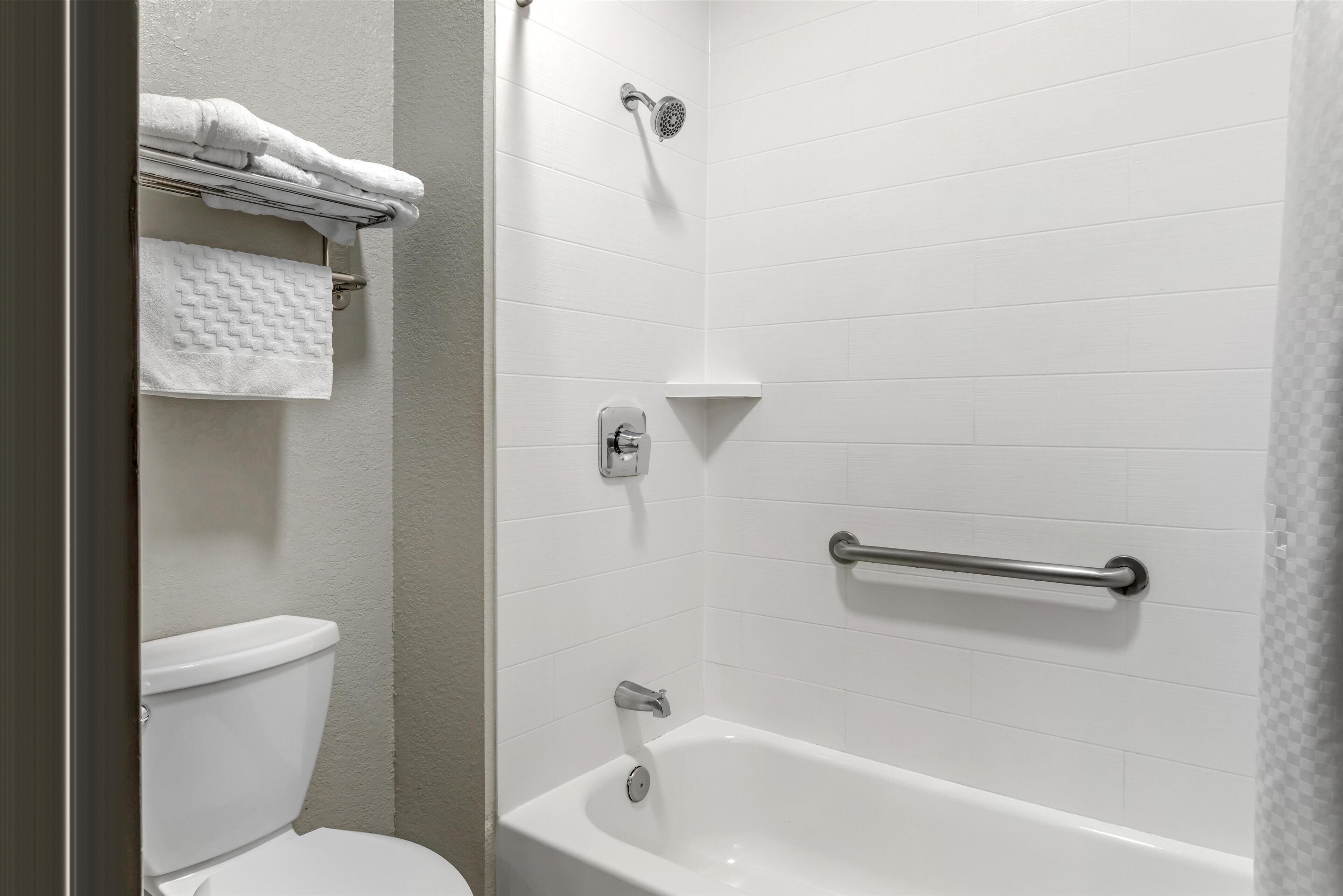 standard room, 2 queen beds, non smoking, refrigerator & microwave | bathroom | free toiletries, hair dryer, towels, soap