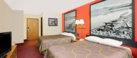 Habitación de hotel con dos camas, un televisor, un cuadro de un lago y una lámpara.
