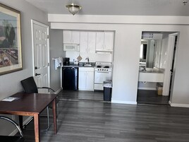 Room, 2 Queen Beds, Non Smoking, Kitchenette | Private kitchen | Fridge, microwave, coffee/tea maker, dining tables