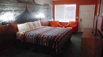 Suite, 1 King Bed | Blackout drapes, iron/ironing board, WiFi