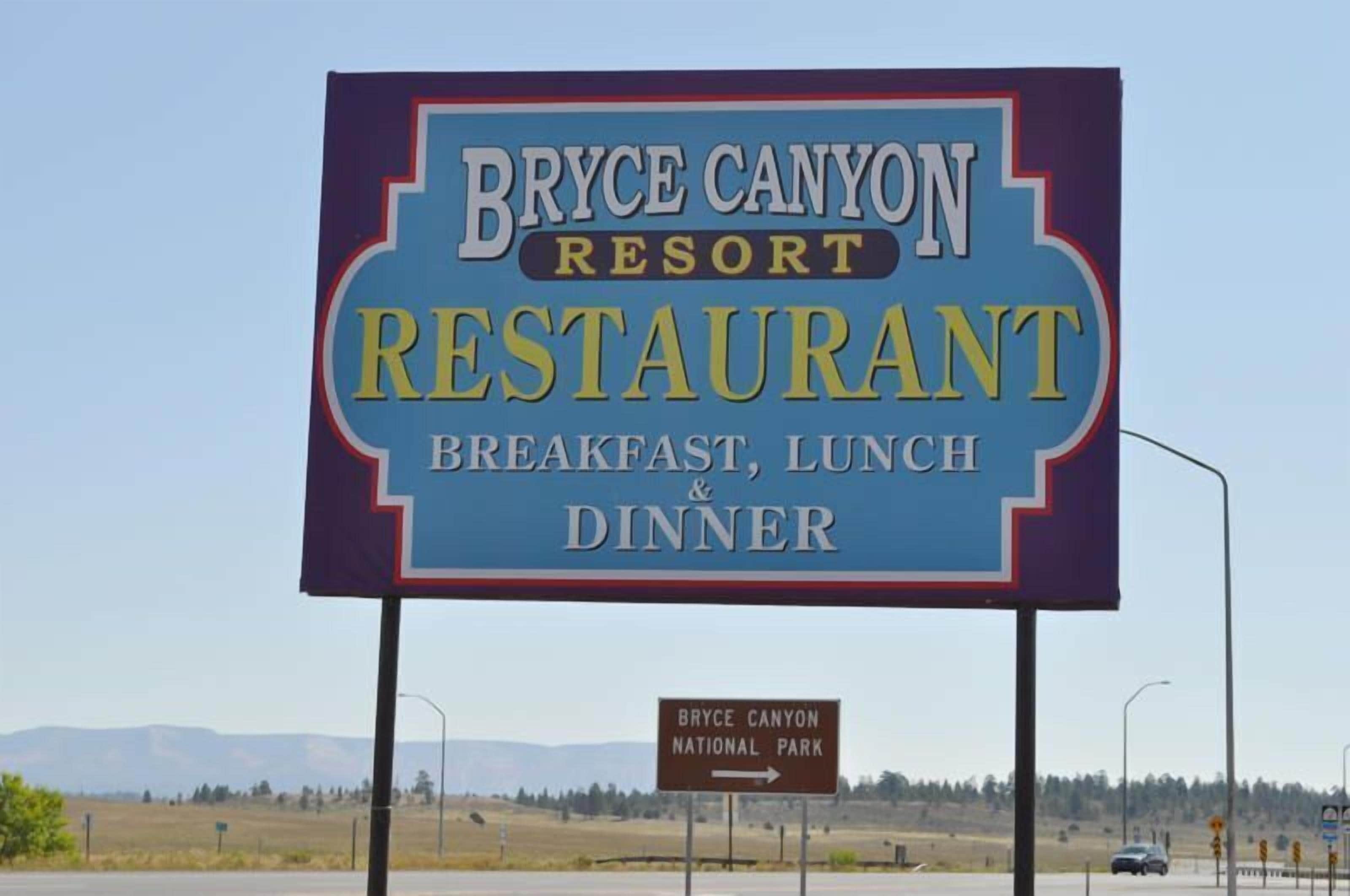 A sign for Bryce Canyon Resort Restaurant, indicating it offers breakfast, lunch, and dinner.