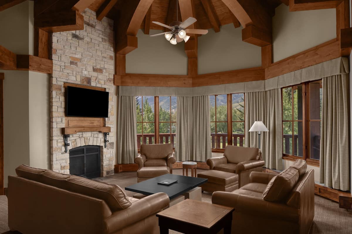 Grand Suite, 1 Bedroom, Balcony | Living room | 42-inch Smart TV with satellite channels, TV, fireplace
