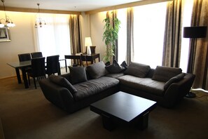 Suíte superluxo | Sala de estar | TV LCD