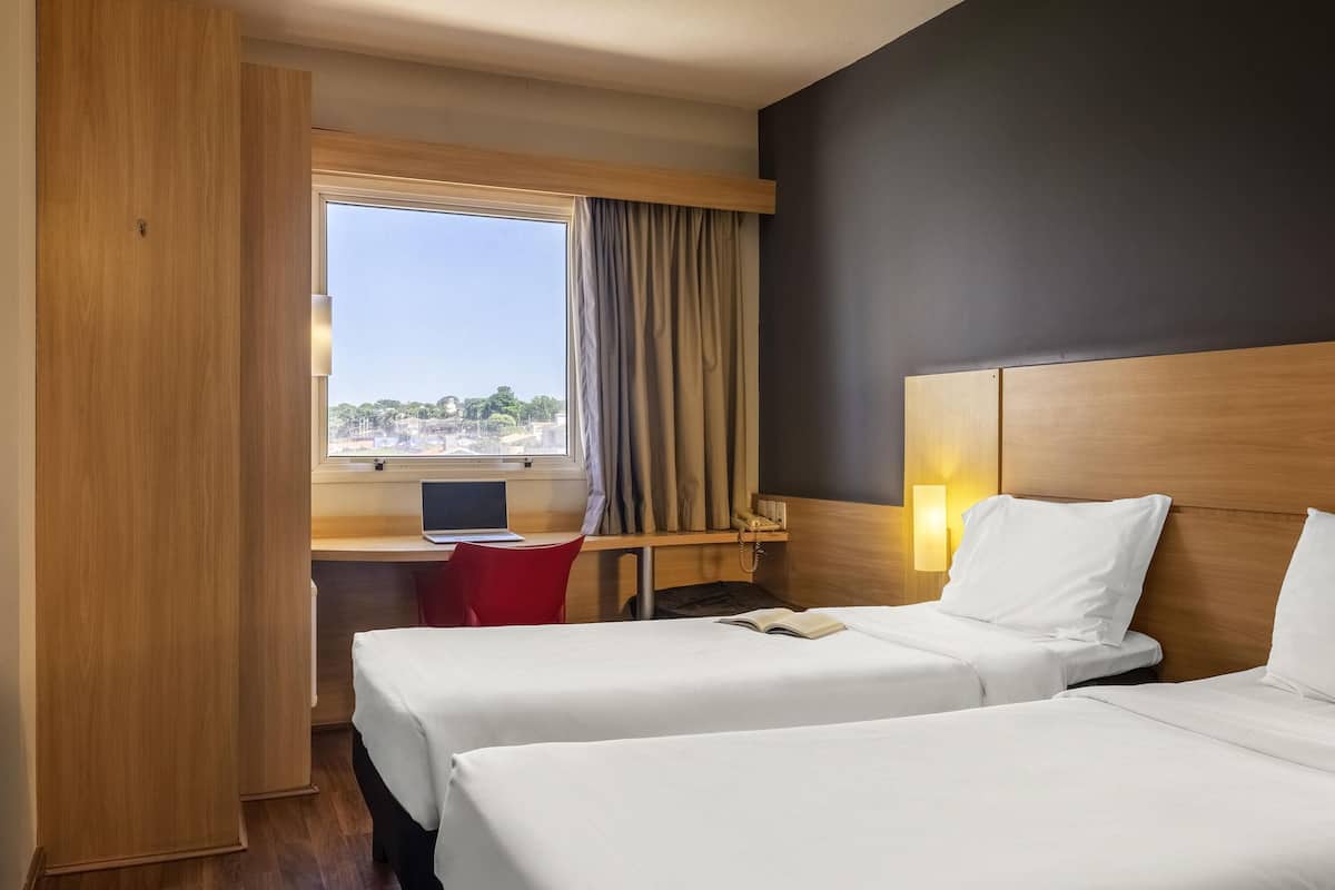 Standard Room, 2 Twin Beds | Minibar, desk, laptop workspace, blackout drapes