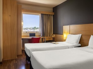 Standard Room, 2 Twin Beds | Minibar, desk, laptop workspace, blackout drapes