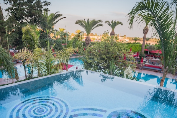 Indoor pool, 4 outdoor pools, pool umbrellas, sun loungers
