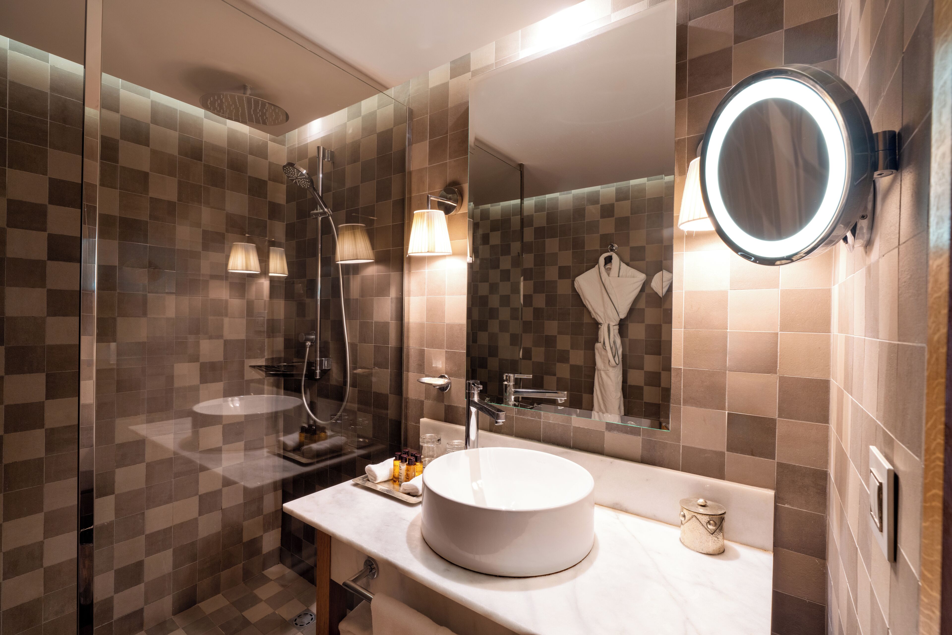 designer toiletries, hair dryer, bathrobes, slippers