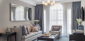 Junior Suite, 1 King Bed | Living area | TV