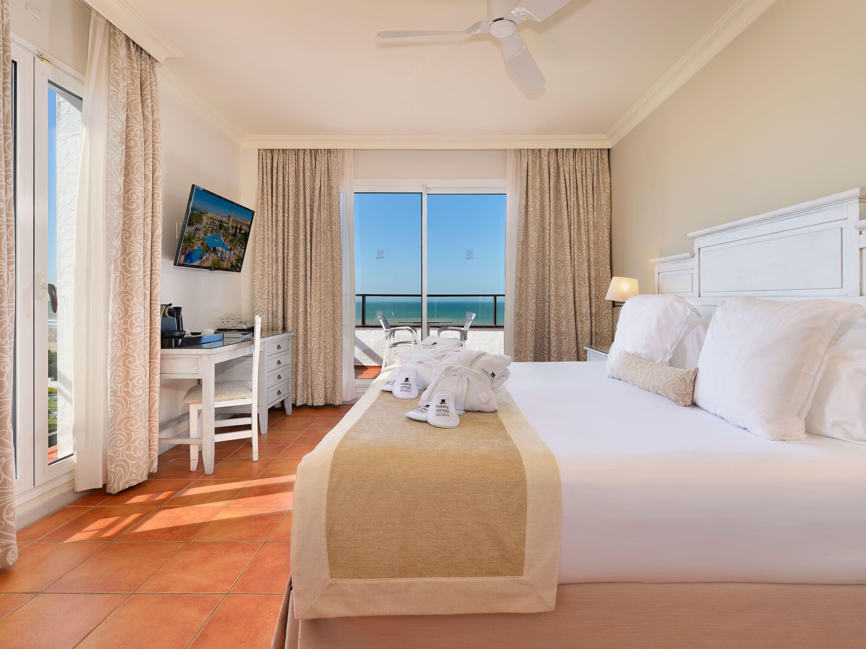 Exclusive Double Room, Sea View | Minibar, desk, iron/ironing board, free WiFi