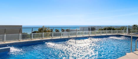Indoor pool, 3 outdoor pools, open 9 AM to 9 PM, pool umbrellas