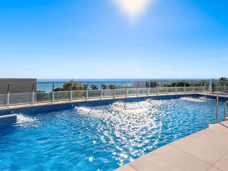 Indoor pool, 3 outdoor pools, open 9 AM to 9 PM, pool umbrellas
