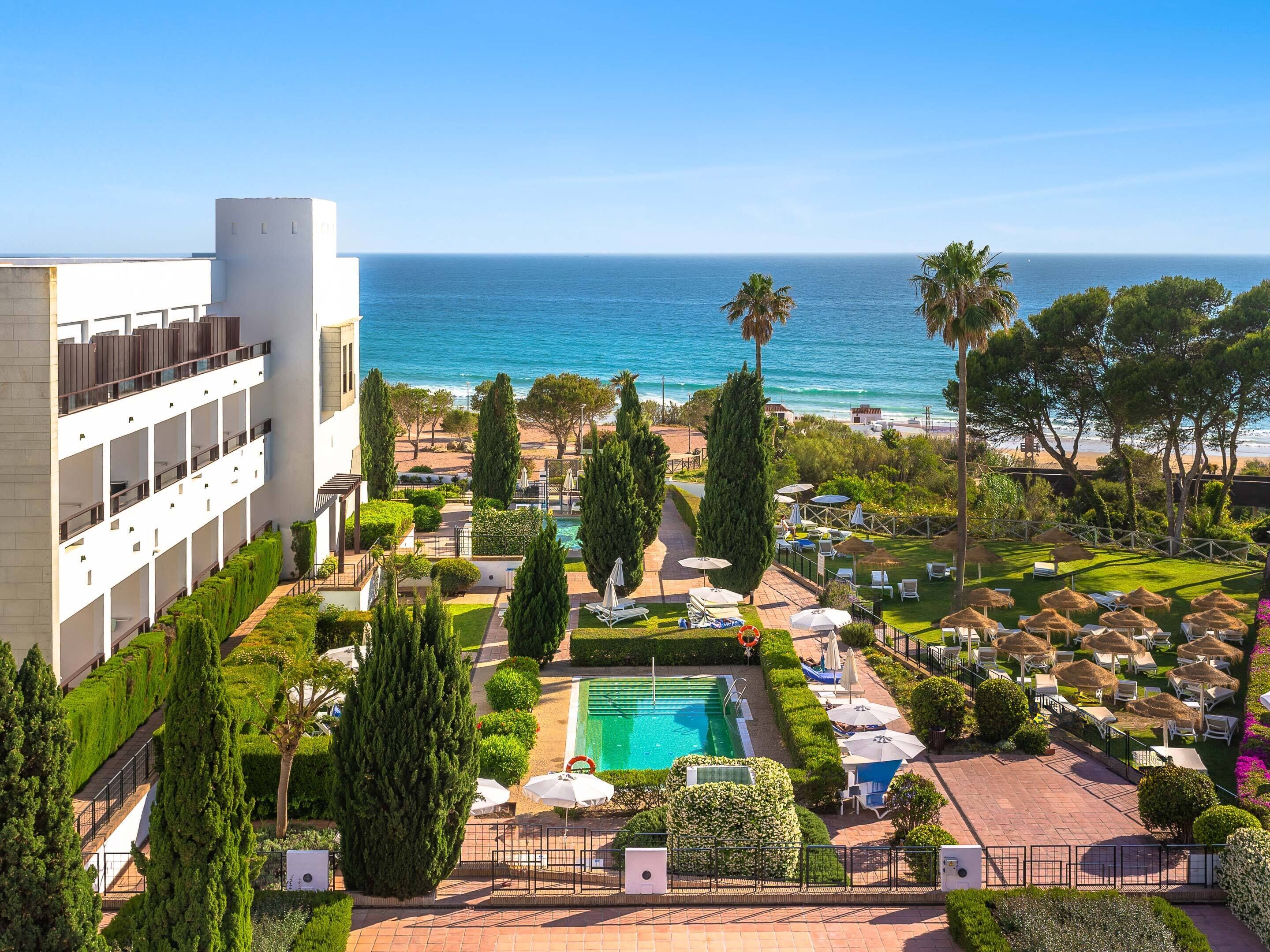 indoor pool, 3 outdoor pools, open 9 am to 9 pm, pool umbrellas