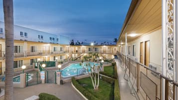 Outdoor pool, pool umbrellas, sun loungers