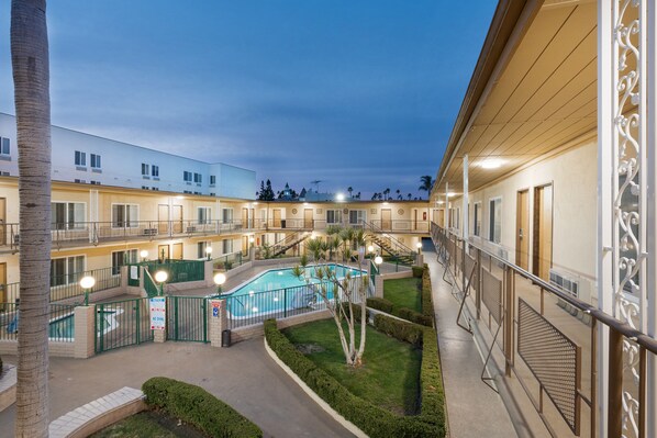 Outdoor pool, pool umbrellas, sun loungers