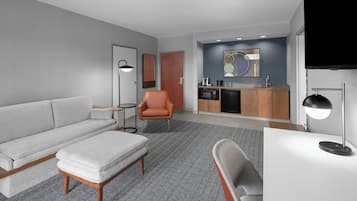 Suite, 1 King Bed with Sofa bed | Living area | 32-inch Smart TV with cable channels, TV, Netflix