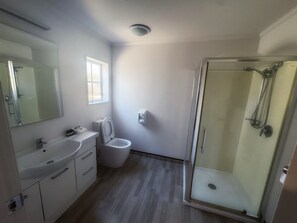 Family Suite, 2 Bedrooms | Bathroom | Shower, hair dryer, towels, soap
