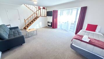 Superior Apartment, 3 Bedrooms | Living area | 32-inch LED TV with satellite channels, TV