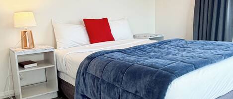 Superior Apartment, 3 Bedrooms | Down comforters, desk, iron/ironing board, free WiFi