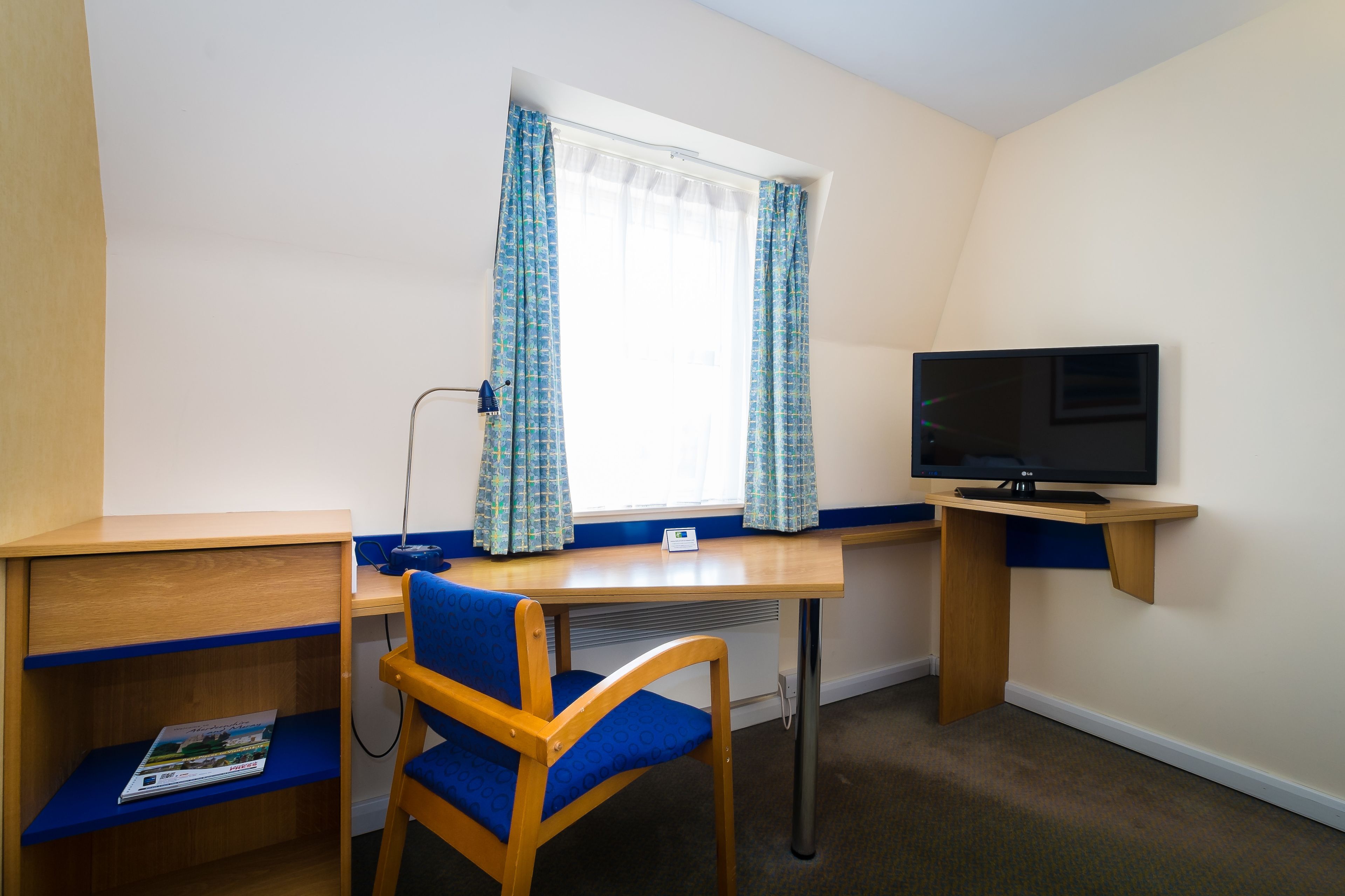 desk, blackout curtains, free wifi, bed sheets