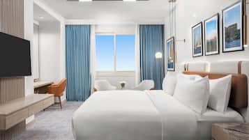 Habitación Deluxe, 1 cama King size | Ropa de cama hipoalergénica, edredón, camas con pillow-top y minibar