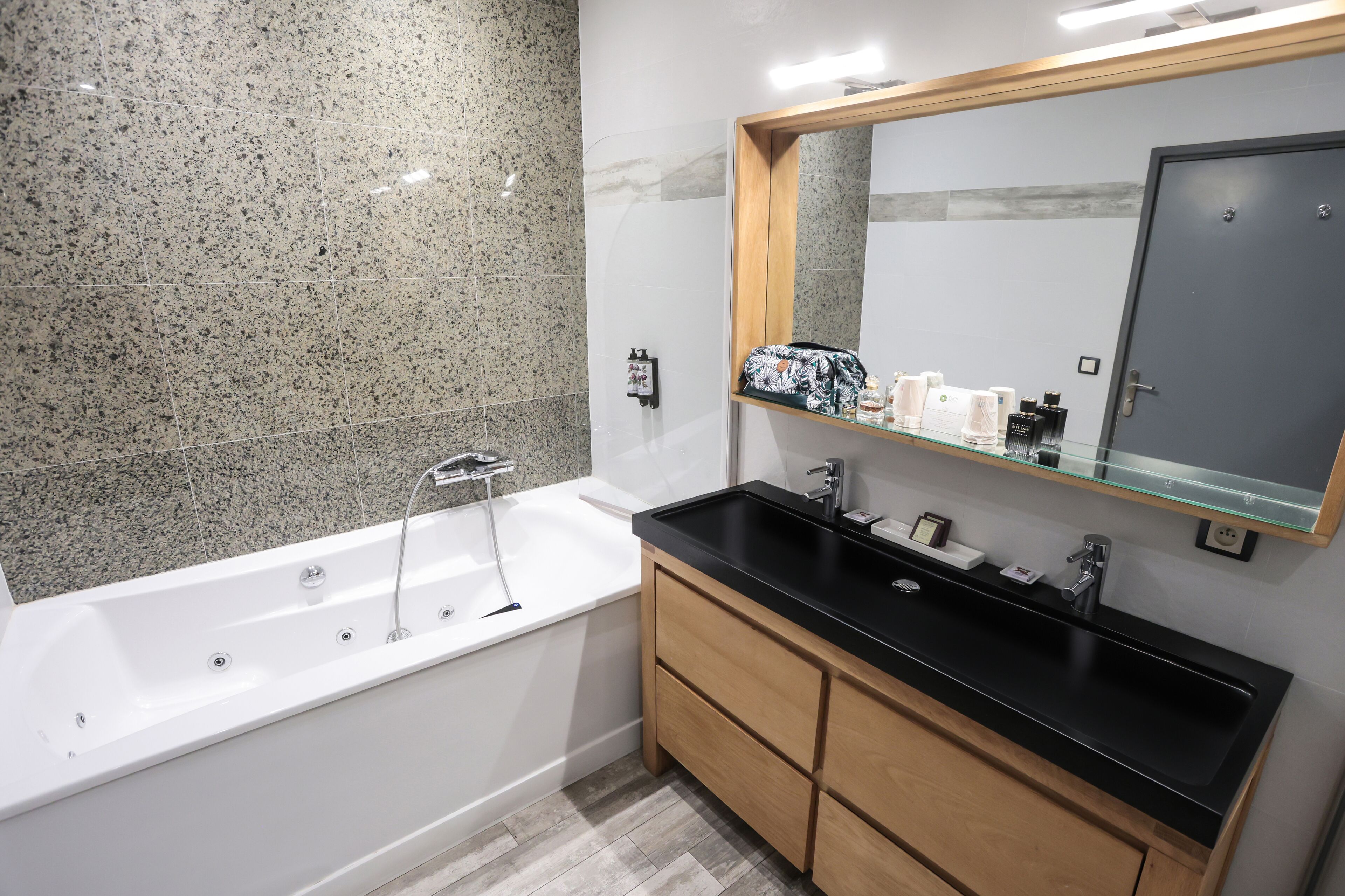 junior suite (free spa access) | bathroom | deep-soaking bathtub, free toiletries, hair dryer, bathrobes