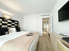 Ropa de cama de alta calidad y minibar
