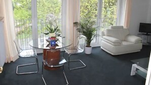 Suite, 1 Tempat Tidur Double | Ruang keluarga