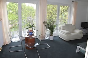 Suite, 1 Doppelbett | Wohnzimmer | Flachbildfernseher
