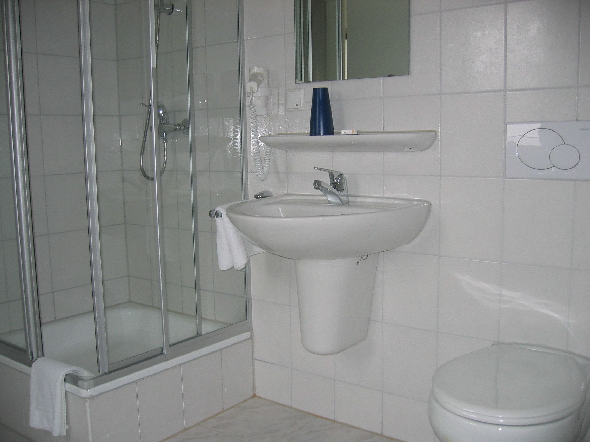 shower, free toiletries, hair dryer, slippers