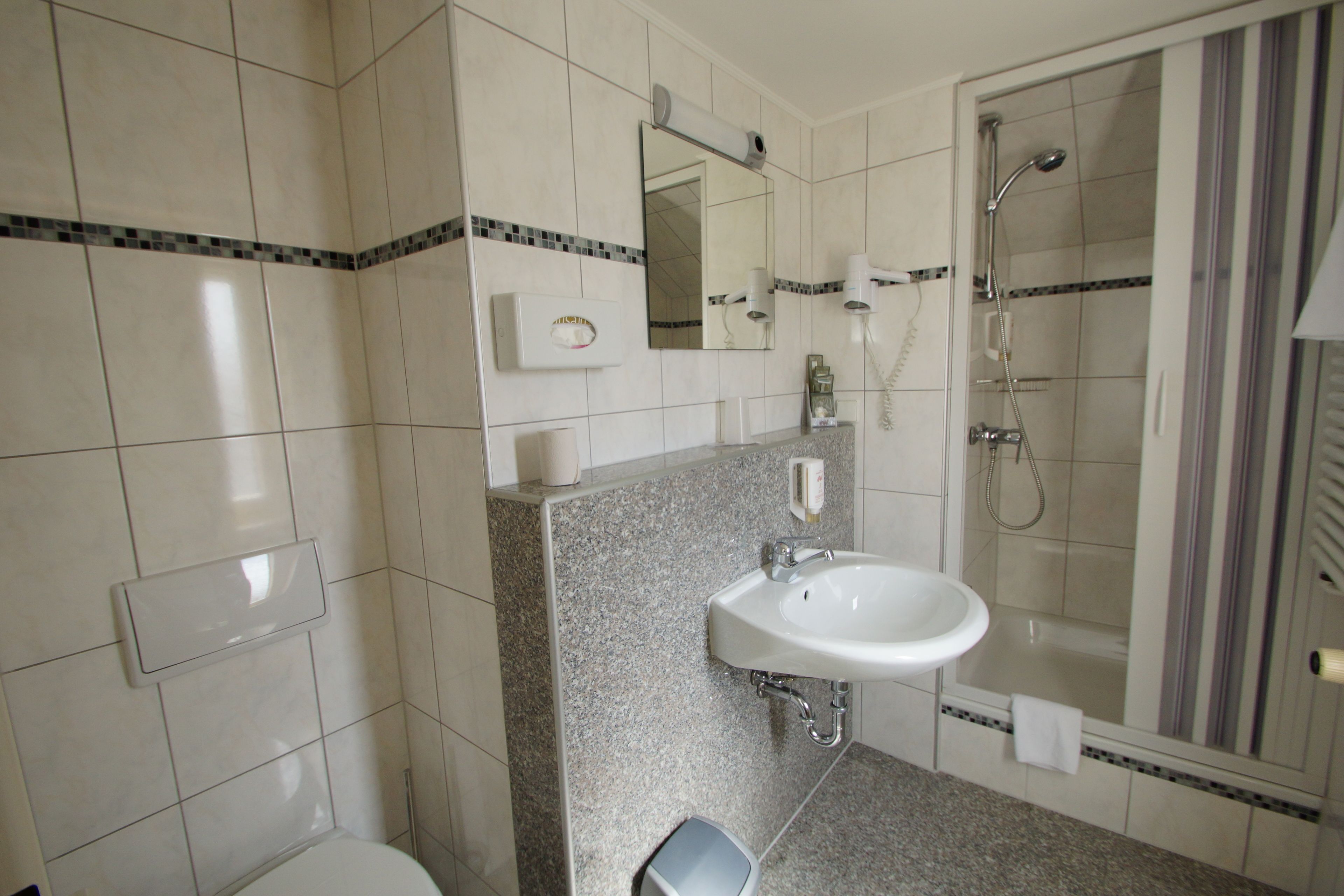 shower, free toiletries, hair dryer, slippers