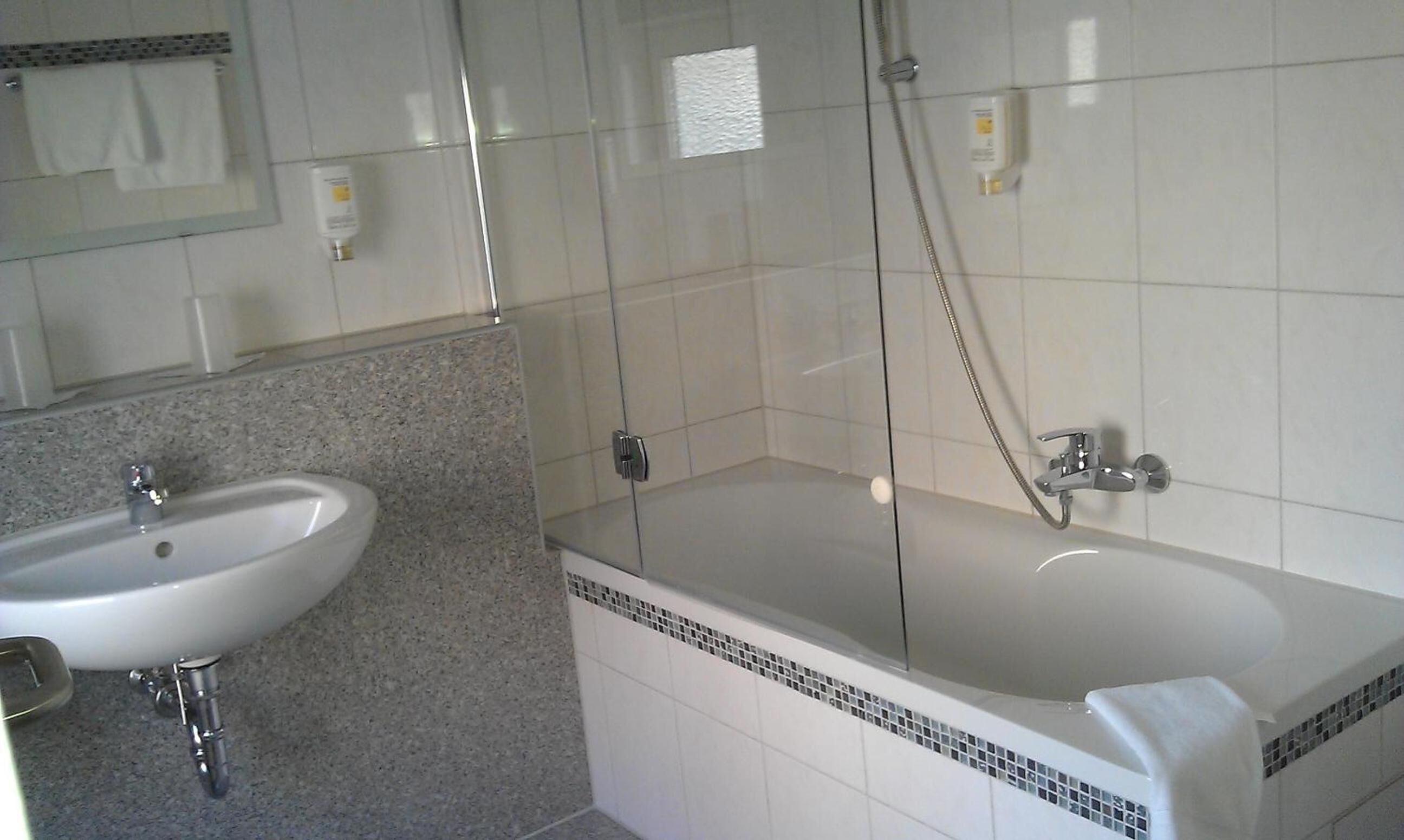 shower, free toiletries, hair dryer, slippers