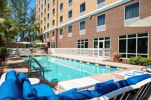 Outdoor pool, open 7:00 AM to 11:00 PM, pool umbrellas, sun loungers