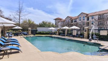 Outdoor pool, pool umbrellas, sun loungers