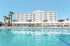 Seasonal outdoor pool, pool umbrellas, pool loungers