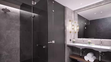 Designer toiletries, hair dryer, slippers, towels