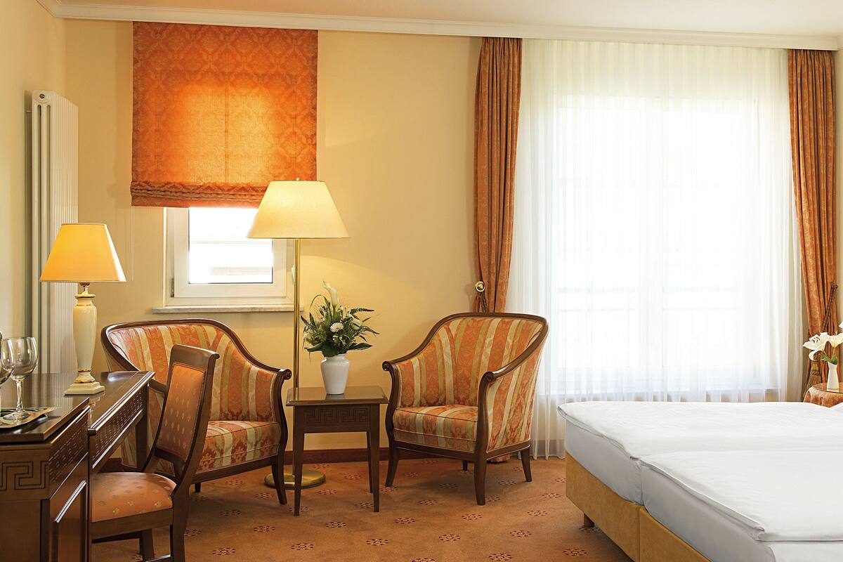 Hypo-allergenic bedding, minibar, in-room safe, desk